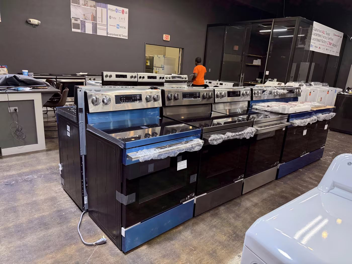 Electric ranges lined up on the Tallahassee floor